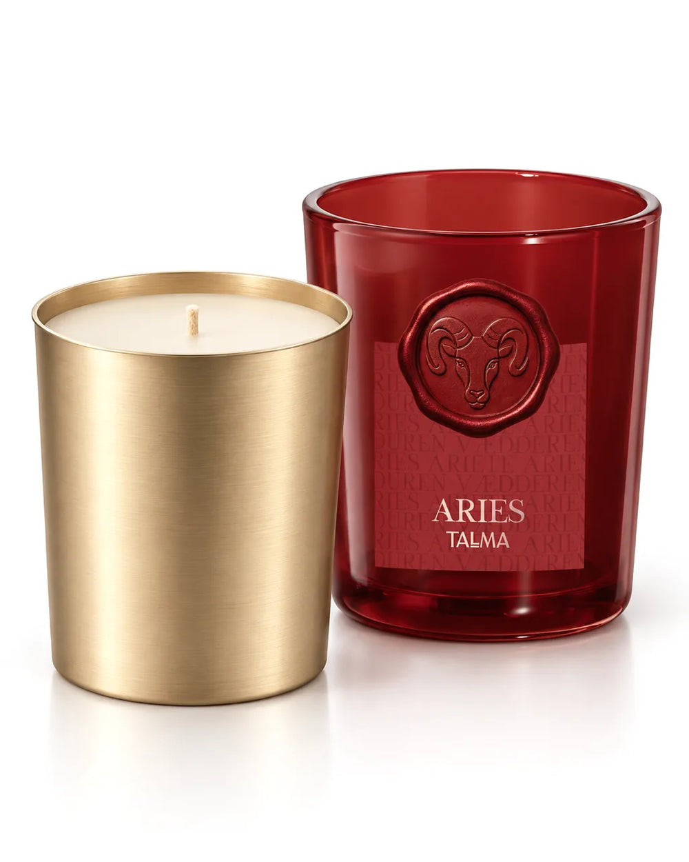 The refill, a golden cup filled with ivory wax, next to an empty TALMA glass